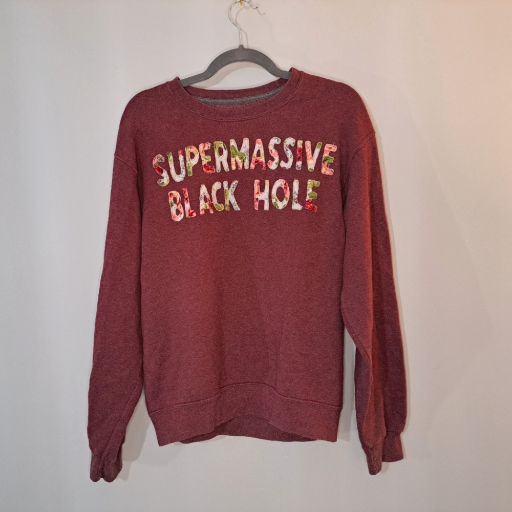 Cozy "Supermassive Black Hole" sweatshirt